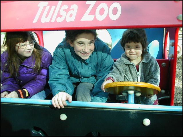 With cousins Hannah and Laura at the Tulsa Zoo.