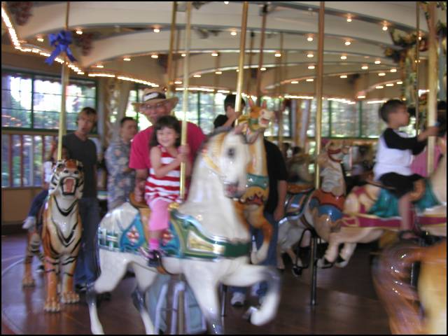 Riding the carousel at the SF Zoo