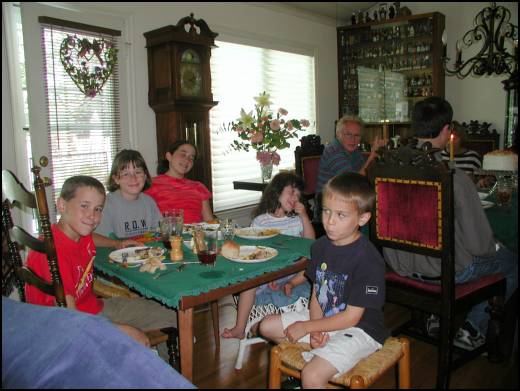 The cousins table -- Caleb, Craig, Hannah, and Laura