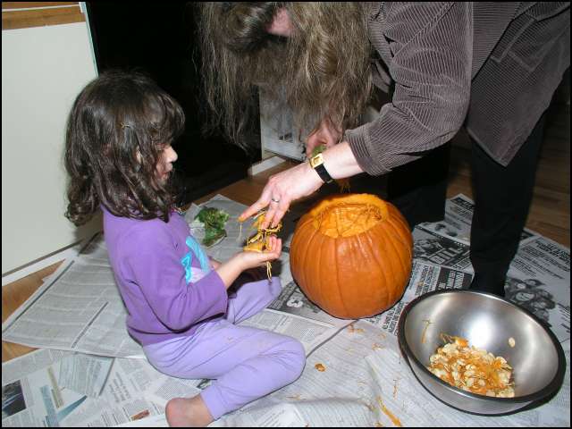 We're getting all the seeds out of the pumpkin