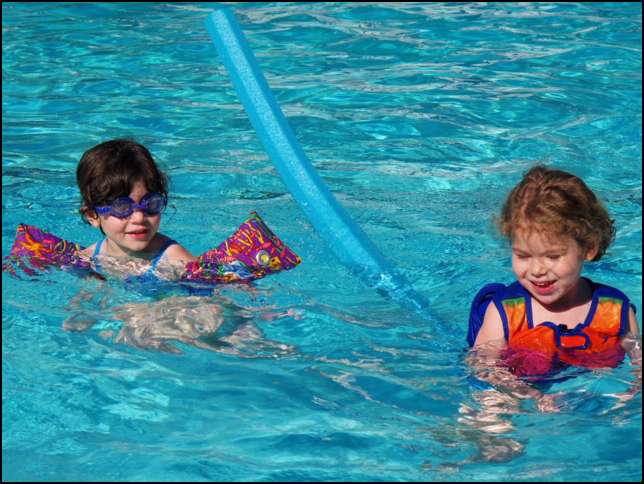 In the Spring, Sydney loved swimming in the pool across the street with Ava -- it was heated!