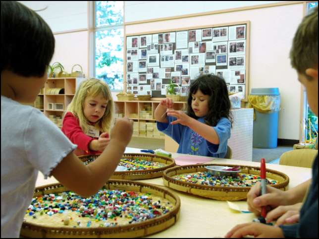 Crafts -- stringing beads -- at Bing Nursery School