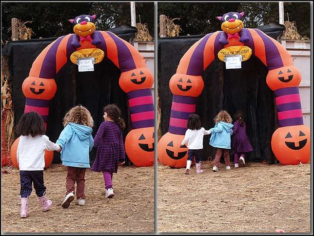 Natalie, Ava, and Sydney going into the spooky house