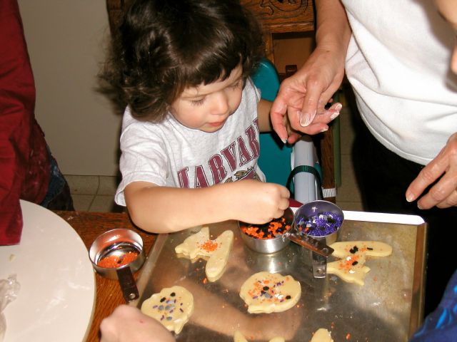 It's fun to bake cookies with Grandma, Laura, and Craig