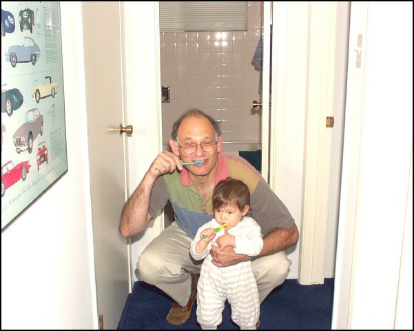 Daddy and me brush our teeth every day