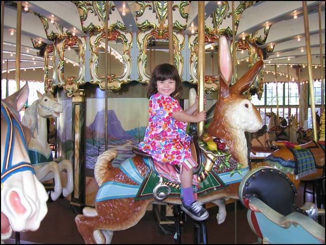 Look at me, riding a rabbit on the carousel at the S.F. Zoo