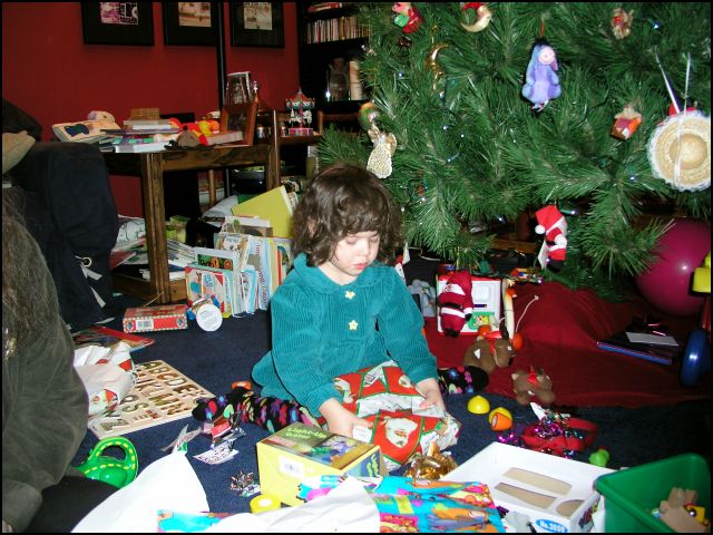 Opening presents at home before going to Tulsa
